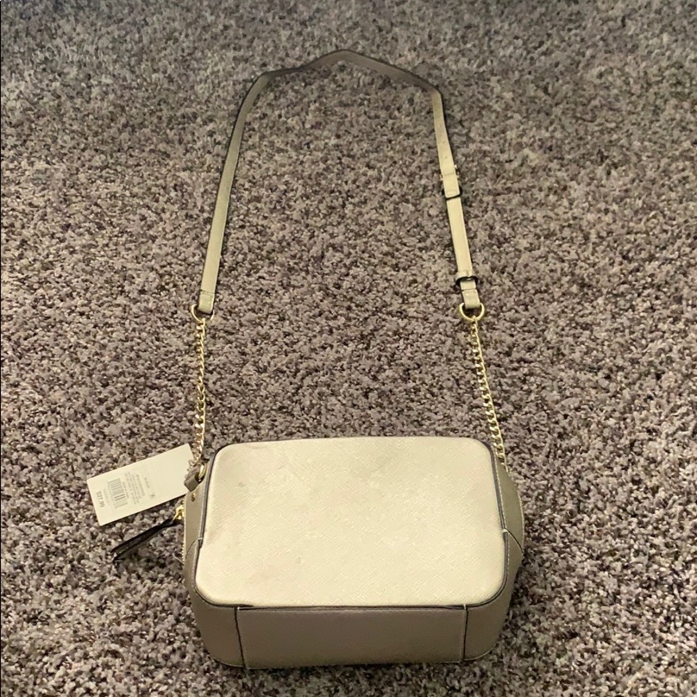 New gold square crossbody purse.
